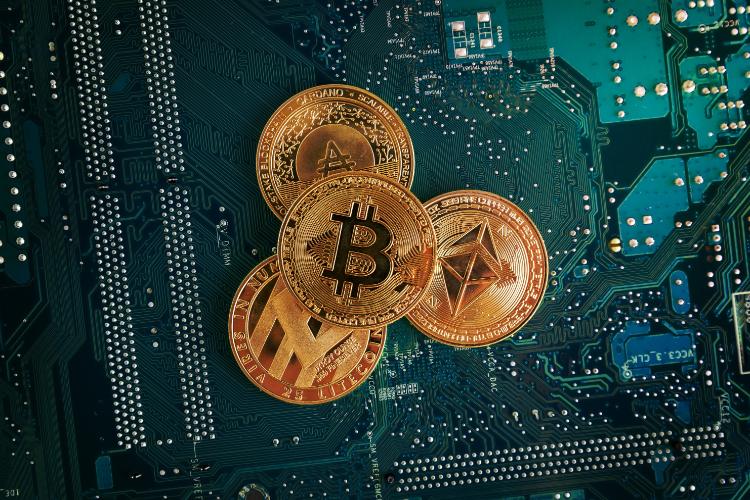 closeup-of-bitcoin-ethereum-litecoin-and-cardano-2025-02-02-20-12-26-utc